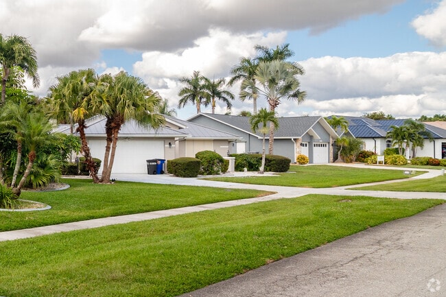 Homes in the Hancock neighborhood of Cape Coral feature well-manicured lawns.