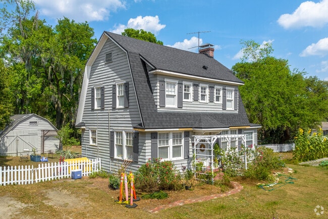 Grow your own garden beside your Dutch Colonial home in the Gordon Heights neighborhood.