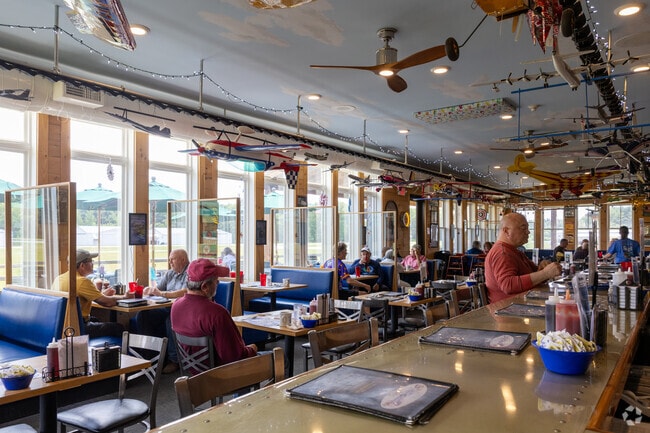 Grab a seat at the bar at the Airfield Cafe in North Hampton to really take in the sights.