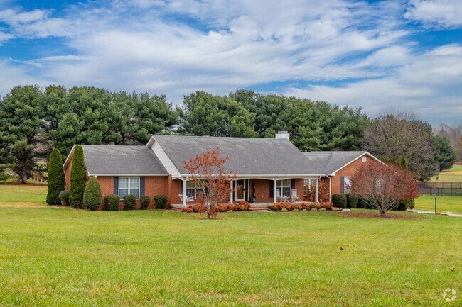 Red brick ranch homes can be found in certain areas of Coopertown.