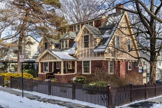 Within blocks of this beautiful Tudor are all the amenities of Brookline Village.