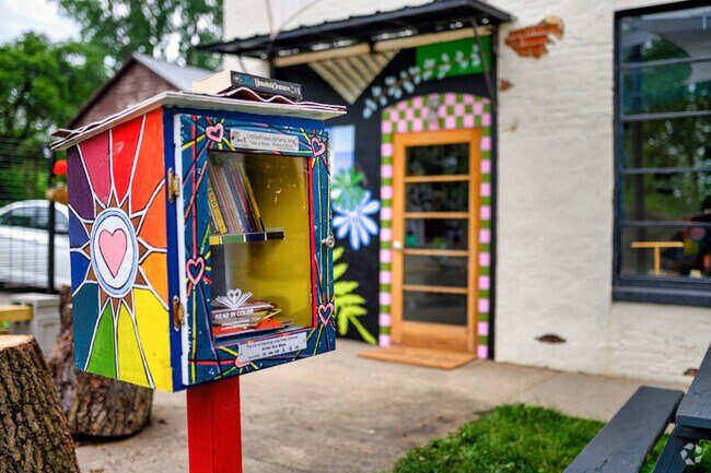 A colorful little library brightens the Jerico building in Edison.