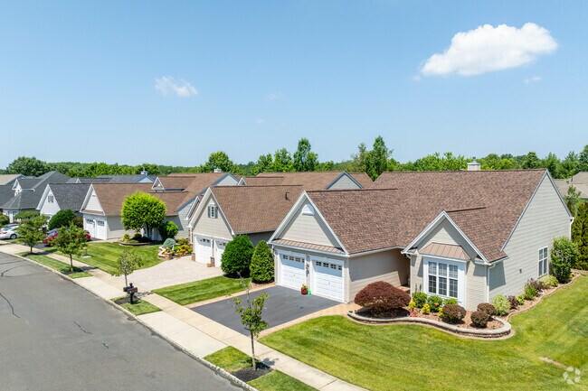 Many Hamilton Marketplace homes include attached garages and driveways, providing convenient parking and extra storage space for residents.