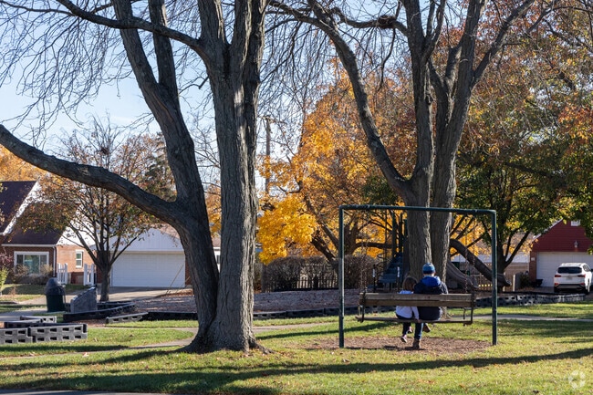 Families gather outdoors in Oakwood to enjoy fresh air and peaceful surroundings.