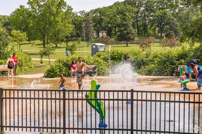 Prosperity Heights residents enjoy the splash pad at Phalen Regional Park.
