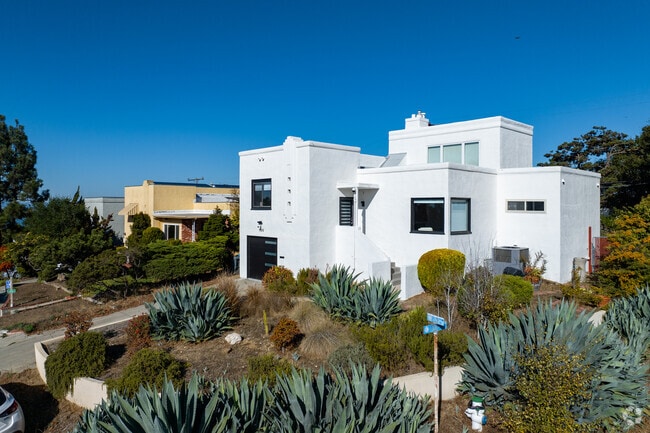 Adobe style homes sit on the Vallejo Heights hillside with art deco architectural details.