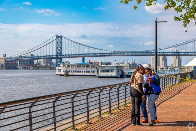 Take scenic pictures with the Ben Franklin Bridge as a backdrop at Wiggins Park in Camden.