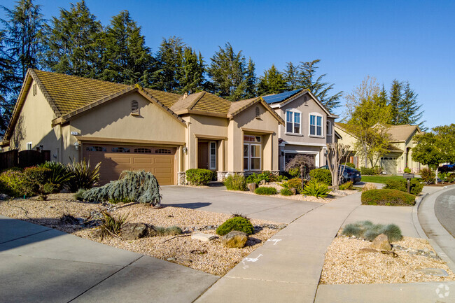 Many homes in Dartmouth have beautiful sidewalks and landscapes.