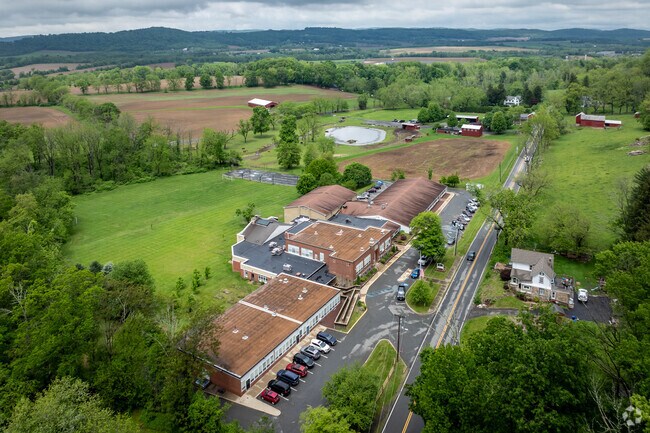Teachers and students work together at Ethel Hoppock Middle School in Bethlehem, NJ, fostering a positive and inclusive learning environment.