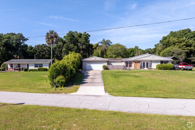 Mature trees in Umatilla foster privacy among neighbors.