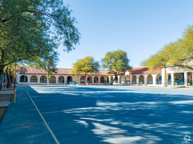 Hollinger K-8 School has a beautiful plaza that doubles as a basketball court for students