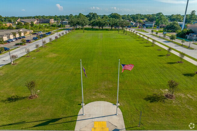The spacious front lawn of Edna Karr High School in Old Aurora.