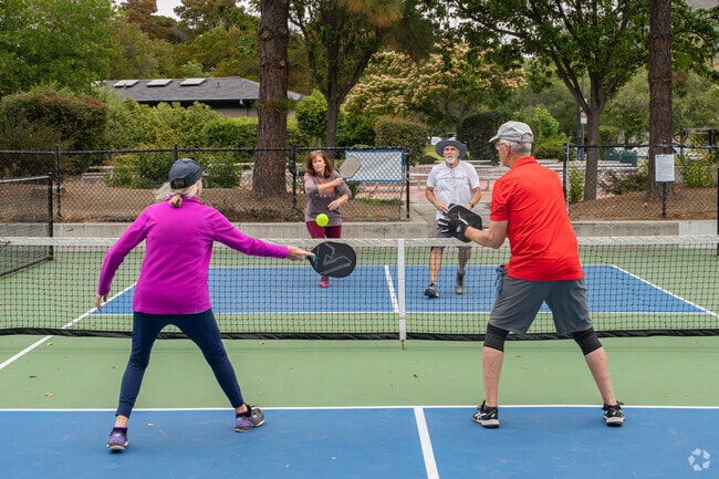 Retired Los Ranchos residents participate in pickleball tournaments at the local park.
