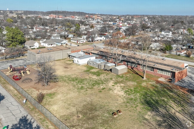 Eagle Point Christian Academy has a large open field and playgrounds for kids to run and play.