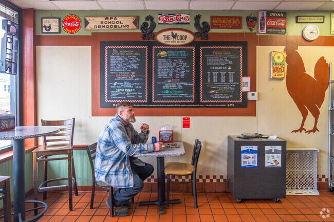 The Coop provides a variety of different sandwiches, burgers, ribs, chicken and more.