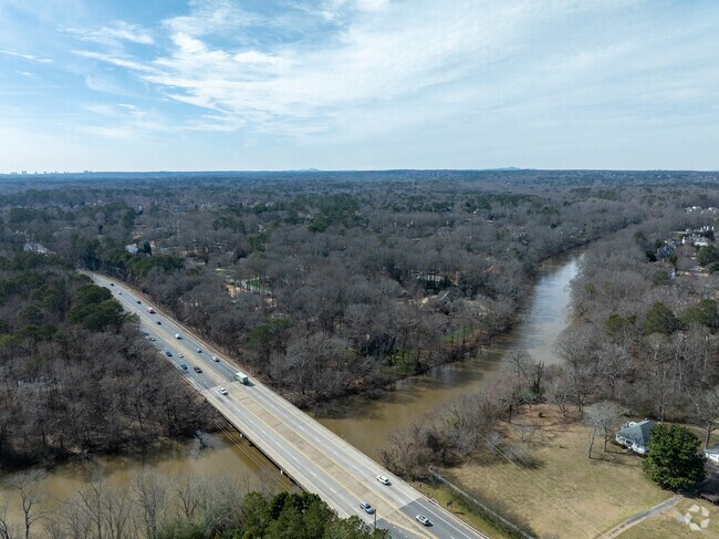 Medlock Bridge Road crosses over the Chattahoochee River, providing a scenic route in the area. The Chattahoochee River is well-known for its recreational opportunities, including fishing, kayaking, and hiking along the riverbanks.