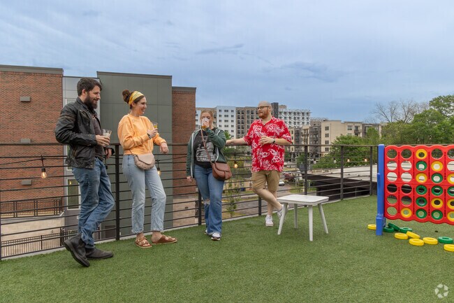 Locals in West End hang out on the rooftop bar at Hoppin'.