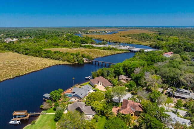 Enjoy life on the water in one of the many houses along the river in Tomoka Oaks.