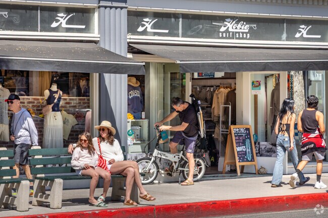 The Village offers local boutiques along with popular brands like Hobie Surf Shop near North Laguna.