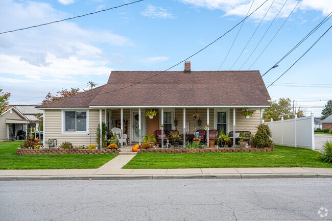 Many homes in Pittsboro feature modest yards and covered front porches.
