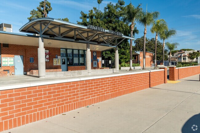 Maxwell Elementary School sidewalk view of front of building.