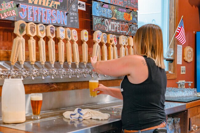 A refreshing cold brew from Woody's Brewing awaits just 7 miles from Centerville.