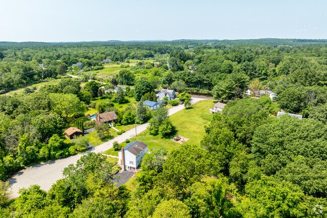An overview of the Littleton Road neighborhood with several home styles from cape cods to colonial revival styled homes.