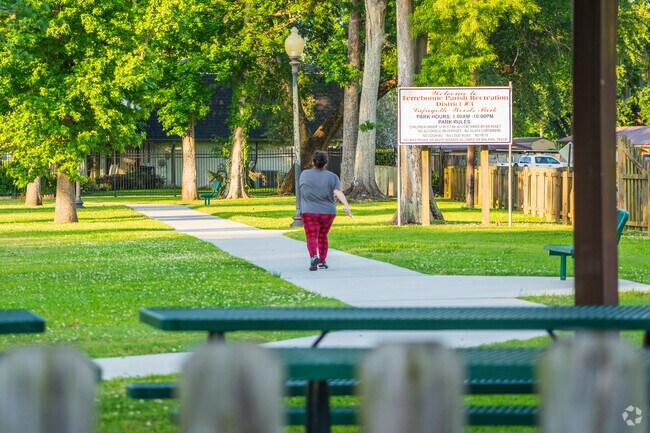 Lafayette Woods Park has a paved path, a playground, and picnic tables for anyone in Presquille to enjoy.
