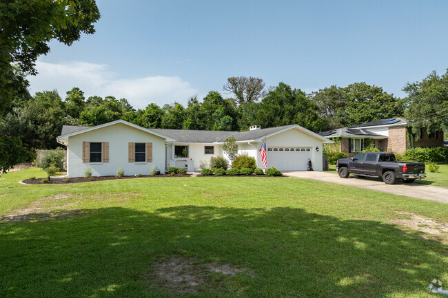 Lake Lorraine Estates has homey Ranchers  with an attached garage to store all the beach gear.