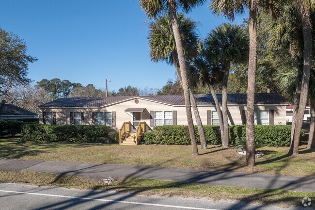 Mature trees surround many of the ranch homes, offering shade and privacy.