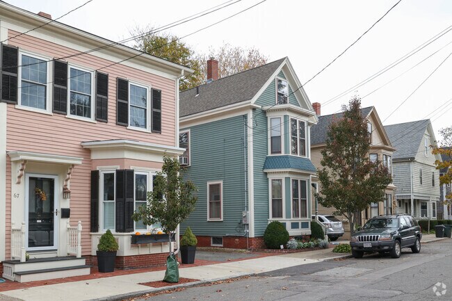 Brightly colored homes line the street in the Newbury are.