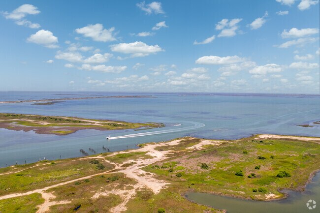 Boats return to Aransas Pass from the Gulf of Mexico.