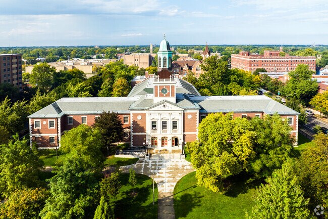 A community space, the Austin Town Hall building features a copper bell tower.