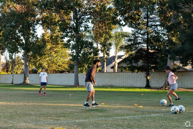Kids enjoy practicing sports at the local park found at Liberty Park.