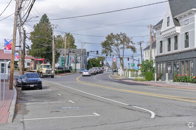 The town center has a wide street with brick sidewalks and plenty of parking.