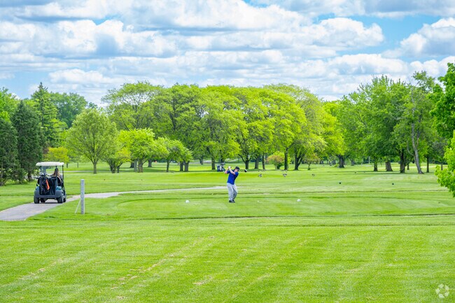 Golfer's enjoy the lush scenery of Foster Park's golf course.