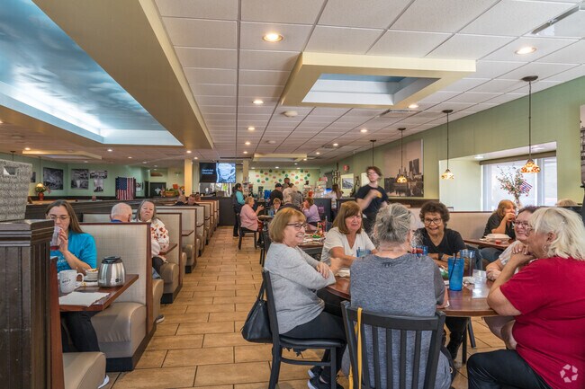 Friends gather for an amazing breakfast at Lincoln Square Pancake House near Mount Comfort.