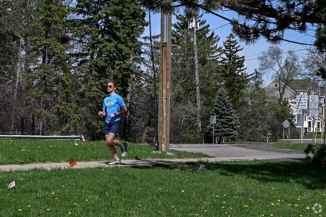 A man takes an afternoon job near South Maple Park, located close to Liberty Glen.