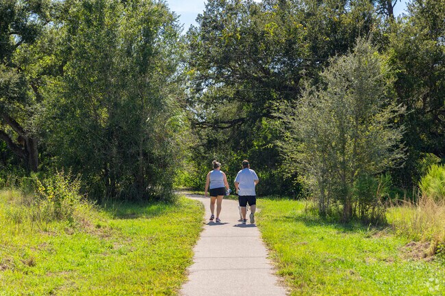 Caloosahatchee Creeks Preserve East near Verandah has trails through protected nature.