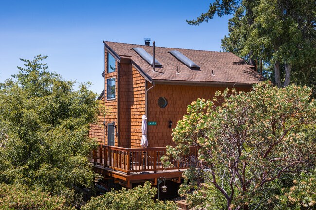 Hillside home with a large deck seen in Pine Cove.