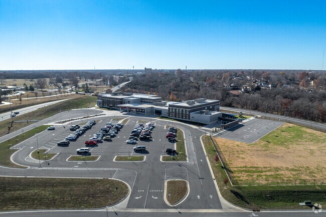 There is a large parking lot at Dover Hills Elementary.