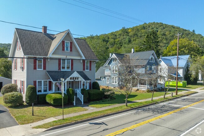 Colonial style homes along Main Street in Picture Rocks sit on smaller half acre lots.