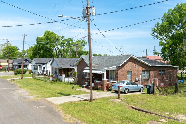 Admire this quiet row of simple houses in Smithfield.