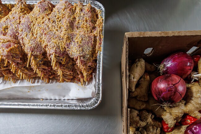 Malam Ishaku Suya serves authentic Nigerian cuisine for events and carryout, adding international flavor to Tremont.