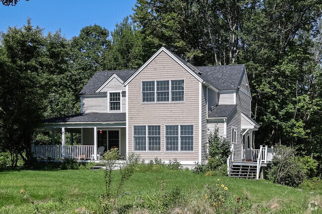 This contemporary 2-story home is nestled on Cousins Island.