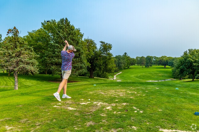 Golf enthusiasts enjoy a round at College Heights Country Club’s 9-hole course.