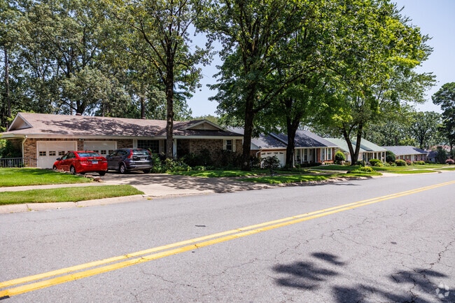 Large trees shade many homes in the Reservoir neighborhood.