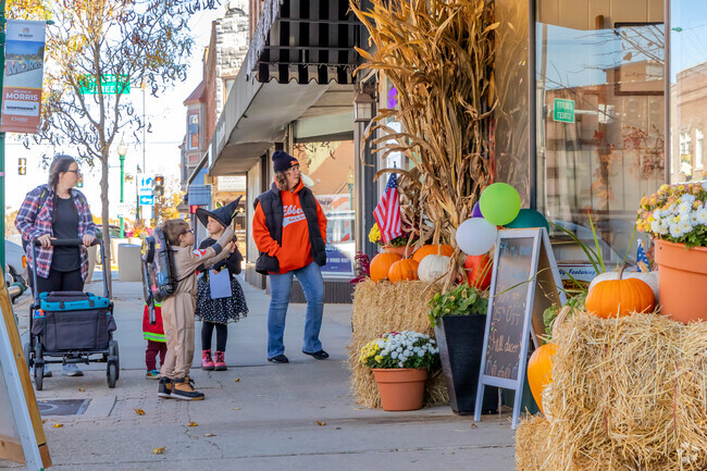 Kids hunt for the hidden Tully Monster in stores, earning treats during Boo Fest in Morris.