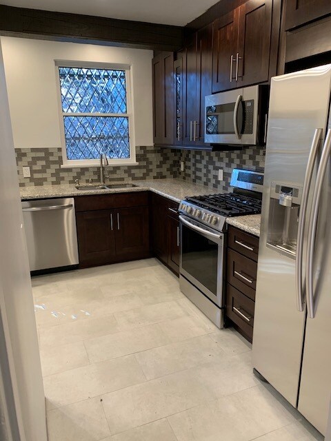 Beautifully remodeled kitchen with stainless steel appliances, first class!