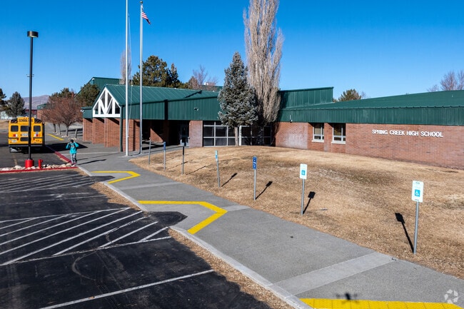 A student gets ready to go home from Spring Creek High School in Spring Creek.